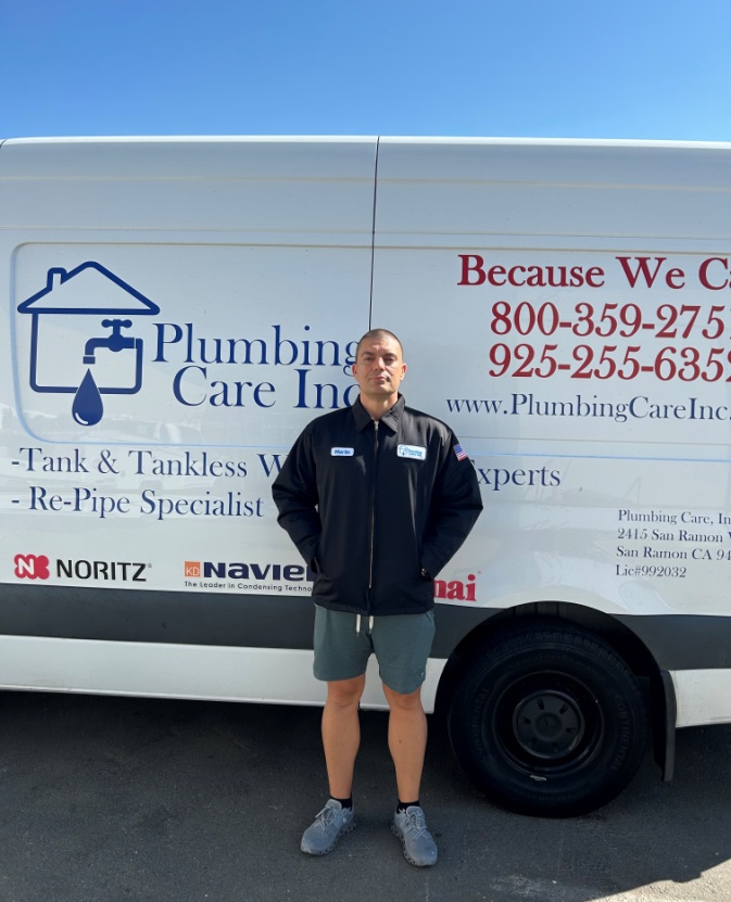 Plumber with Plumbing Care Inc. Van